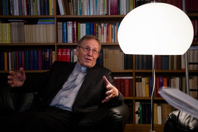 In this photo taken on  Wednesday, Sept. 17, 2014, Cardinal Walter Kasper speaks during an interview with the Associated Press, in his home at the Vatican. The German theologian says he fully expected the knives would come out when, at Pope Francis' request, he made a suggestion that challenged a deep church taboo and has dominated debate ahead of a landmark meeting on Catholic family life that opens this weekend - the fate of Catholics who divorce, and the outcome will be a key test of how far Francis' reform agenda will go. (AP Photo/Domenico Stinellis)