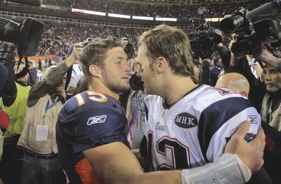 Barry Gutierrez/AP
Tim Tebow and Tom Brady