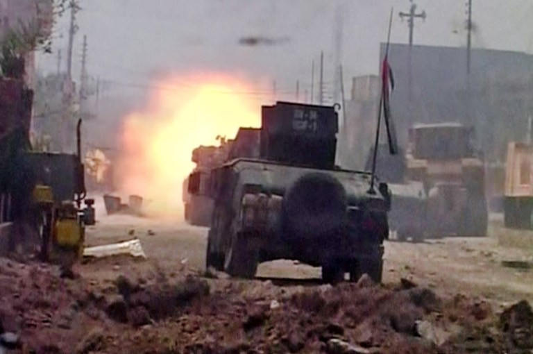 —œFrom the center of al-Julan neighborhood, we congratulate the Iraqi people and the commander in chief ... and declare that the Fallujah fight is over,