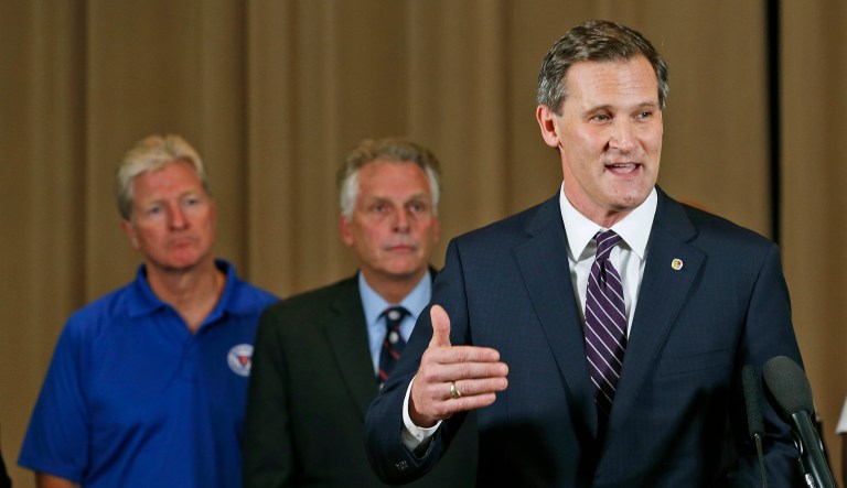 Charlottesville Mayor Mike Signer, right, said Thursday the City Council is meeting behind closed doors to discuss personnel matters following the Aug. 12 white supremacist rally that turned violent in the heart of the city. (AP Photo/Steve Helber)