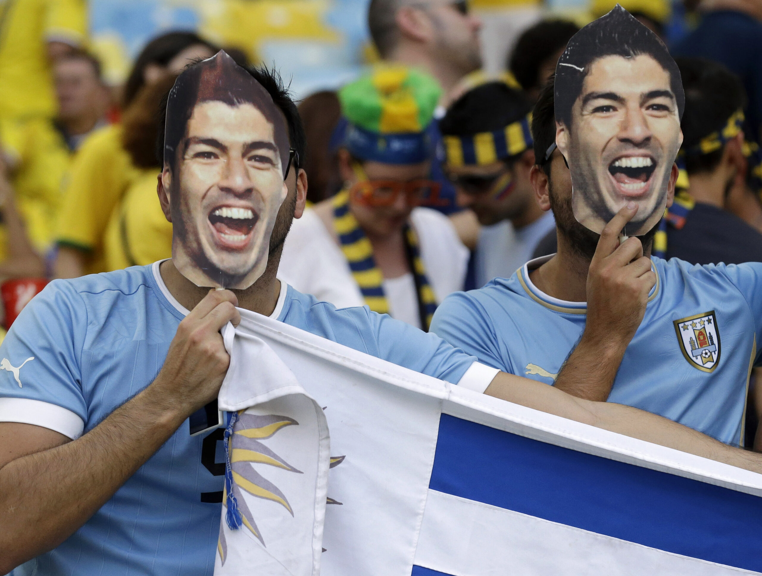Suarez idolized, not blamed for Uruguay’s exit