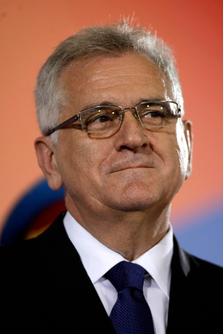   Serbian president, Tomislav Nikolic, smiles during his ceremonial inauguration in Belgrade, Serbia, Monday, June 11, 2012. Serbia's Balkan neighbors boycotted Nikolic's inauguration on Monday, claiming statements by the new Serbian nationalist leader reignite wartime tensions and cast doubt over his proclaimed pro-European Union goals. (AP Photo/ Marko Drobnjakovic)  