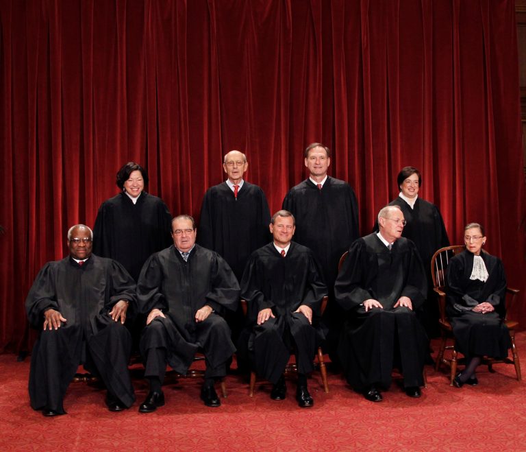 This Oct. 8, 2010 file photo shows the justices of the U.S. Supreme Court in a group portrait at the Supreme Court Building in Washington. (AP Photo/Pablo Martinez Monsivais)