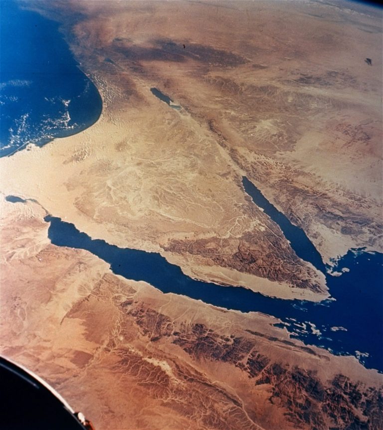 FILE - This undated file photo released by NASA, taken from 175 miles up by Gemini II, shows the Sinai Peninsula, center, in Egypt. Suspected militants in Egypt's Sinai abducted six security personnel as they headed to Cairo for holidays early Thursday, May 16, 2013, security officials said, the first such kidnapping of security forces in the increasingly lawless peninsula.(AP Photo/NASA, File)