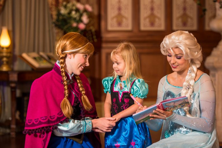 This undated image released by Disney shows Disney characters Anna, left, and her sister Elsa, right, from the animated film 