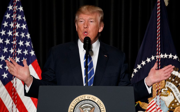 Four states — Washington, New York, Oregon and Minnesota — sue over President Trump's newest travel ban actions. The state of Hawaii was the first to go to court against Trump's new immigration ban, in a suit on Tuesday. (AP Photo/Evan Vucci)