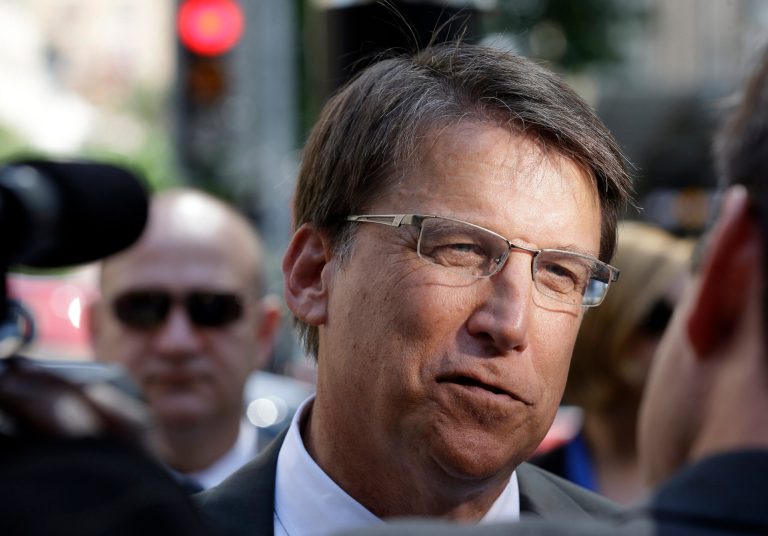 FILE- In this Sept. 10, 2014, file photo, North Carolina Gov. Pat McCrory speaks to members of the media in Raleigh, N.C. In a letter dated Oct. 6 to French officials, McCrory said the plain packaging proposal may detract from more effective ways of curbing cigarette use. The French bill requiring neutral cigarette packs by 2016 is slated for debate in French Parliament next year. (AP Photo/Gerry Broome, File)