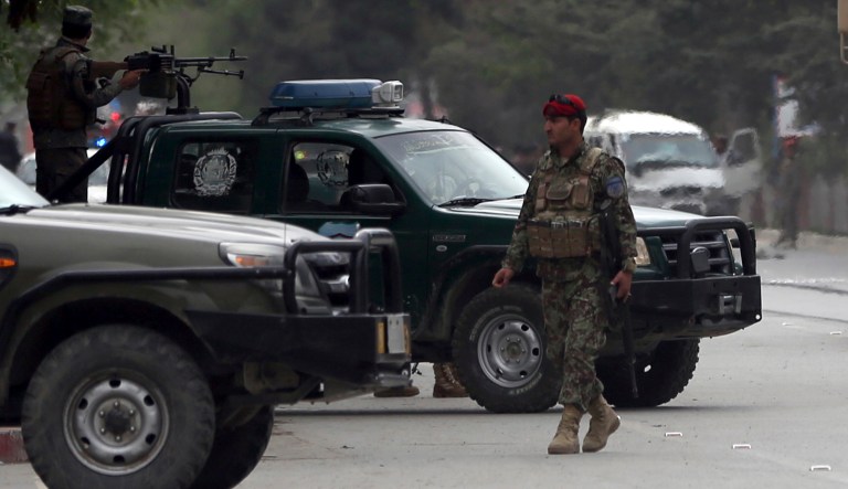 The convoy was hit by a roadside bomb and attacked with small arms fire, the Pentagon said, and returned fire. (AP Photos/Massoud Hossaini)