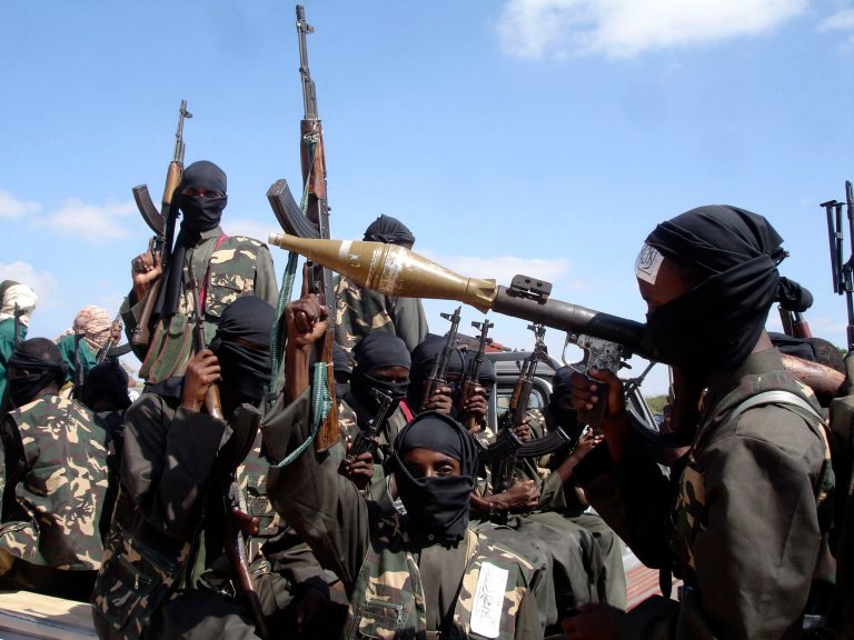 Armed al Shabab fighters just outside Mogadishu, Somalia, prepare to travel into the city in pickup trucks after vowing there would be new waves of attacks against Ethiopian troops in December 2008. (AP Photo/Farah Abdi Warsameh, File)