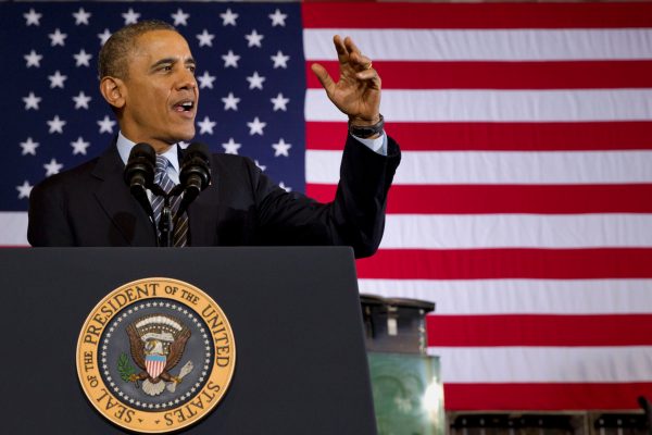 Obama signs farm bill that trims food stamps