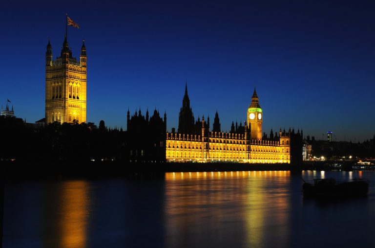 LONDON, ENGLAND - JULY 23:  The Houses of Parliament are lit up at dusk on July 23, 2012 in London, England.  (Photo by Mike Hewitt/Getty Images)