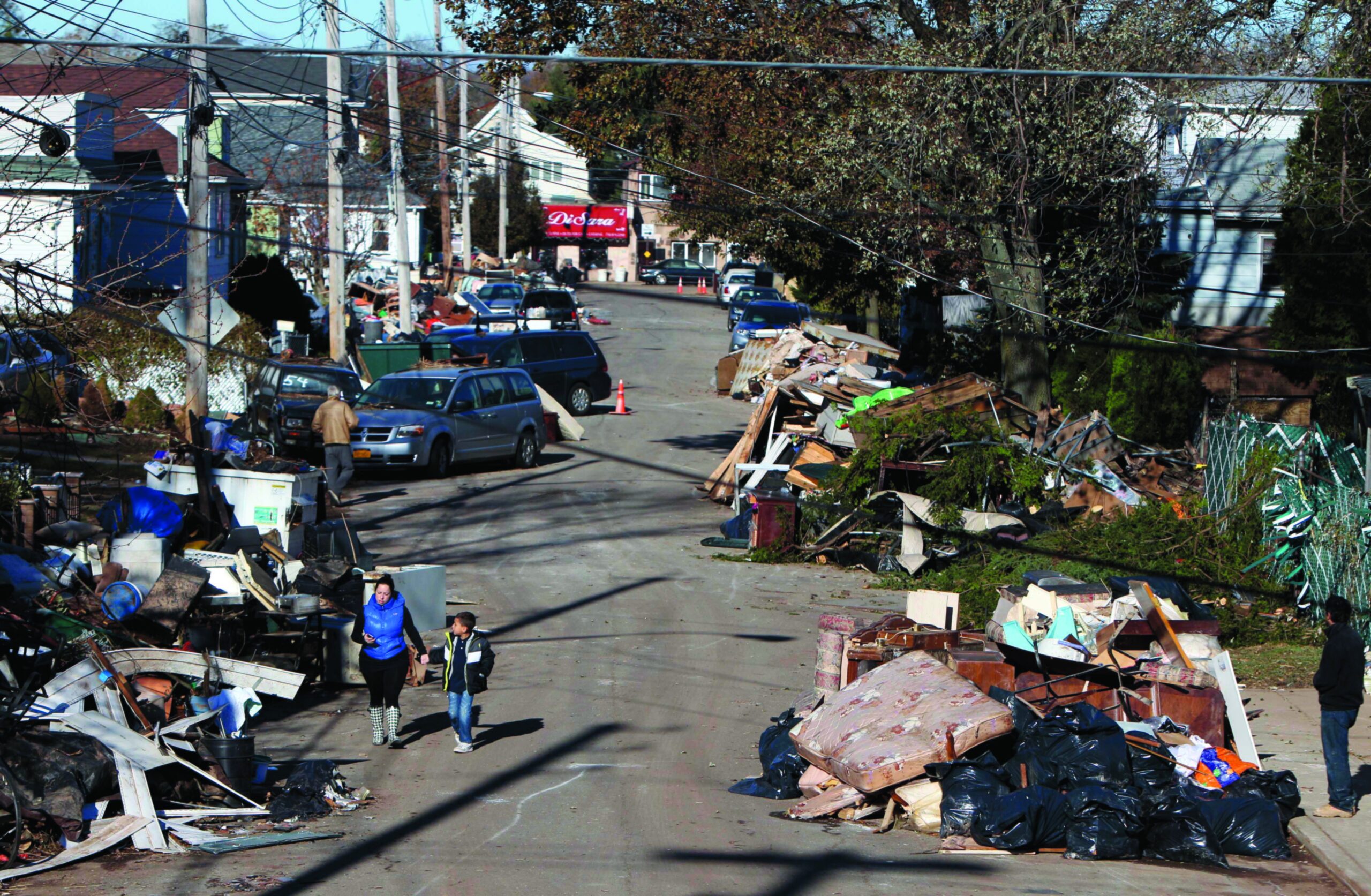 Cold weather and new storm add to victims’ misery