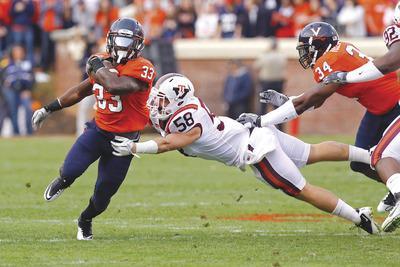 Geoff Burke/Getty Images
Jack Tyler(58)got only one late scholarship offer coming out of Oakton High, so he instead chose to walk on at Virginia Tech, where he has earned both a scholarship and starting spot at mike linebacker.