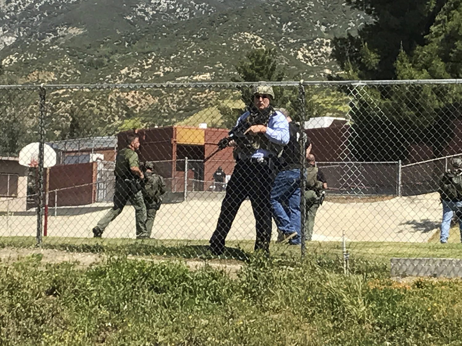 Police: 2 adults dead, 2 students wounded in apparent murder-suicide at San Bernardino school