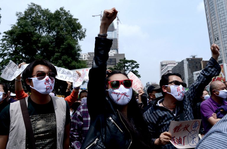 Chinese people wear face masks with 