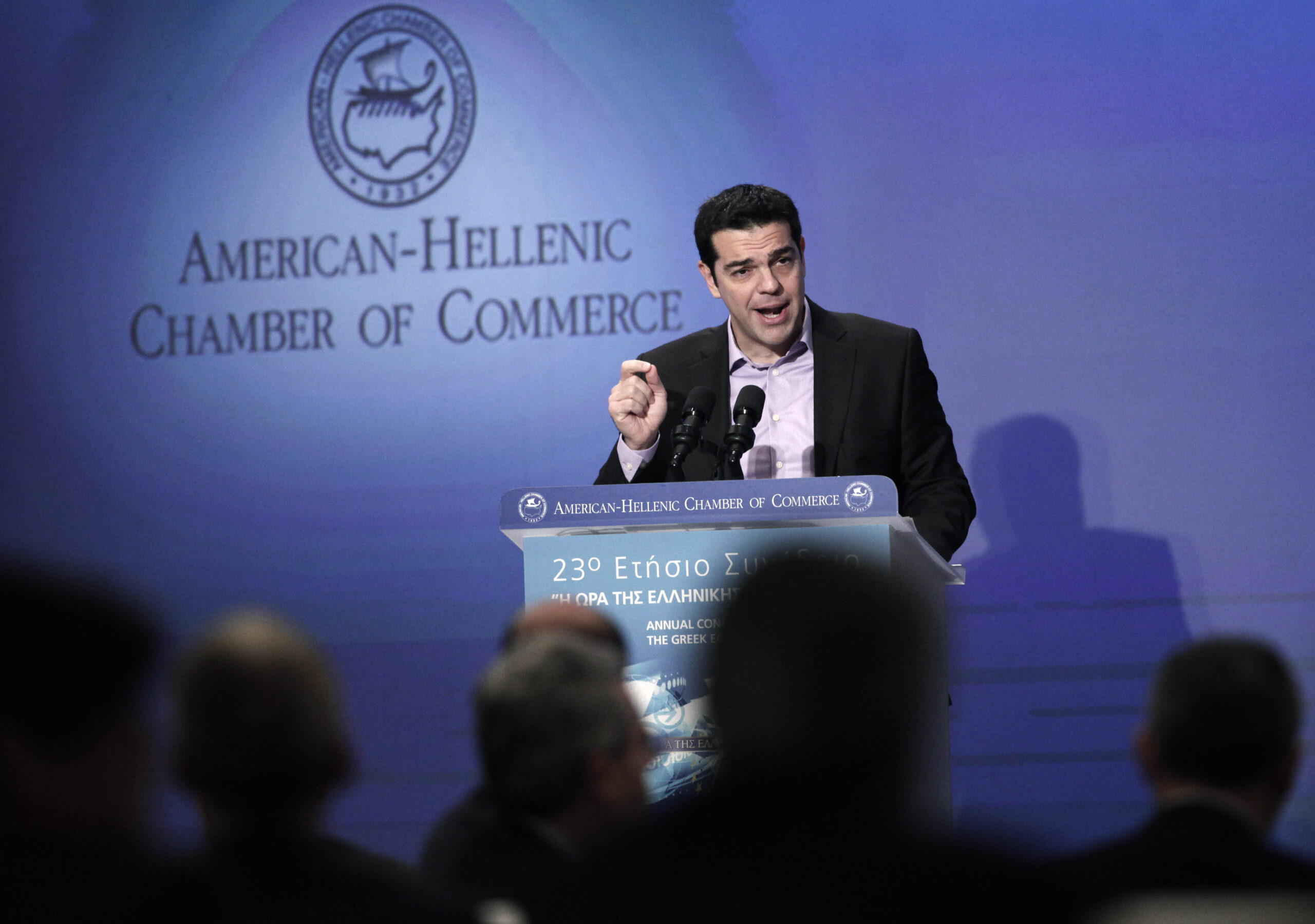 Greek PM pledges first glimmer of recovery in 2013