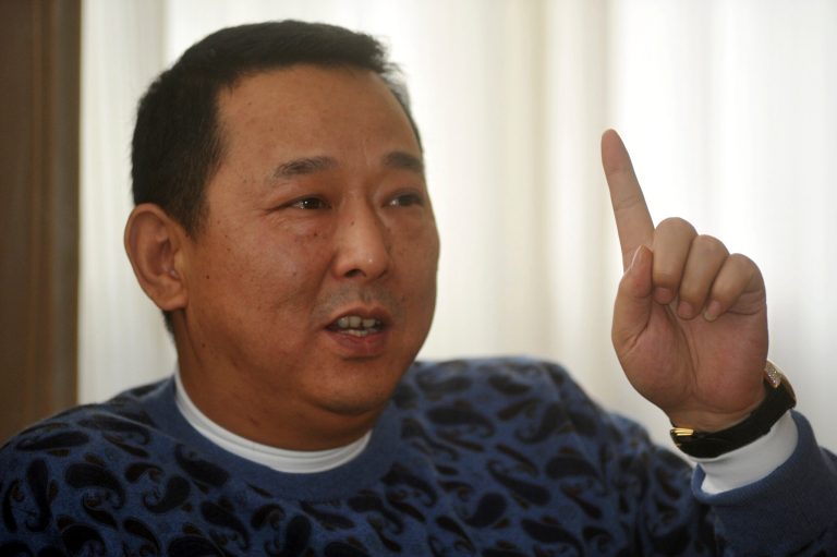 FILE - In this Jan. 16, 2011 file photo, Liu Han, a former multimillionaire chairman of energy conglomerate Sichuan Hanlong Group with stakes in Australian and U.S. miners, is seen in Chengdu, in southwestern China's Sichuan province. The former Chinese mining tycoon was sentenced to death Friday, May 23, 2014, for leading a crime gang that killed rivals, a state news agency reported, in a case that revealed ties between organized crime and politicians. (AP Photo, File) CHINA OUT