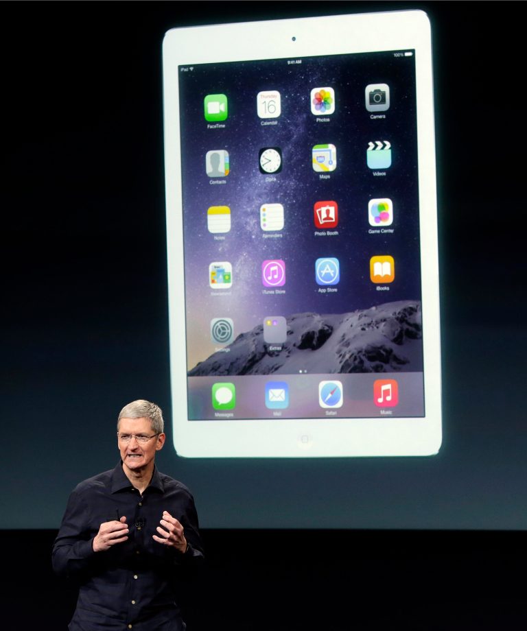 Apple CEO Tim Cook introduces the new Apple iPad Air 2 during an event at Apple headquarters on Thursday, Oct. 16, 2014 in Cupertino, Calif. (AP Photo/Marcio Jose Sanchez)