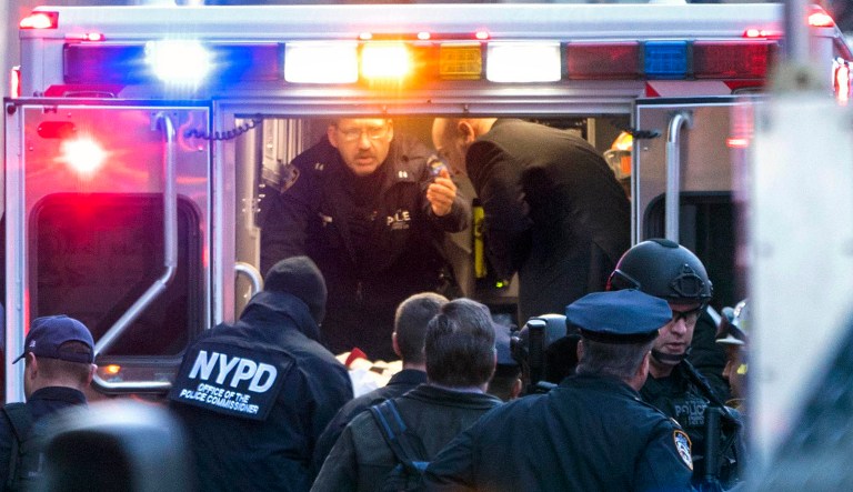 Officials took suspect Akayed Ullah to receive medical treatment Monday. Ullah is suspected of strapping a pipe bomb to his body and setting off the crude device in a subway tunnel, injuring himself and others. (Craig Ruttle/Newsday via AP)