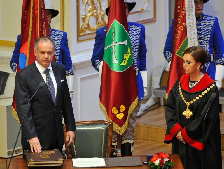 New Slovak President Andrej Kiska, left, takes his presidential oath in the presence of the chairwoman of the Constitutional Court Ivetta Macejkova, right, at a ceremonial parliamentary session in Bratislava, Sunday, June 15, 2014. Kiska is the fourth head of state since the establishment of independent Slovakia in 1993. (AP Photo,CTK/Jan Koller)  SLOVAKIA OUT