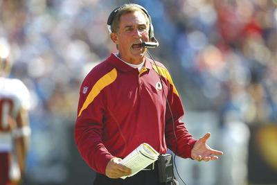 Dilip Vishwanat/Getty Images
Mike Shanahan, the Redskins'seventh coach in the last 11 years, has a 5-10 mark this season and an 11-20 record in Washington.