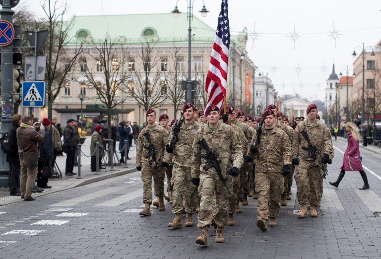 Military parades set a bad precedent by blurring the separation between martial and civilian spheres. (AP Photo/Mindaugas Kulbis)