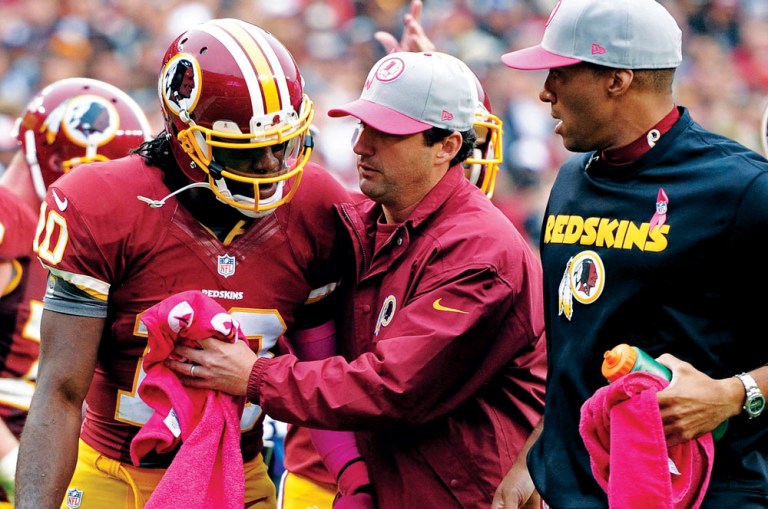 Patrick Smith/Getty Images
Redskins quarterback Robert Griffin III, who suffered a concussion Sunday, said he had no symptoms in practice Wednesday.