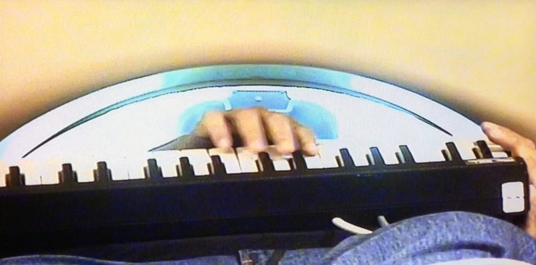 This undated handout photo provided by the Johns Hopkins University School of Medicine, shows a jazz pianist playing inside an MRI machine. Jazz musicians are famous for musical conversations _ one improvises a few bars and another makes up an answer. Researchers at Johns Hopkins University in Baltimore had jazz pianists play this way inside MRI machines to show how their brains respond, and found that language regions enable the musical back-and-forth much like a spoken conversation. (AP Photo/Dr. Charles J. Limb, Johns Hopkins University School of Medicine)