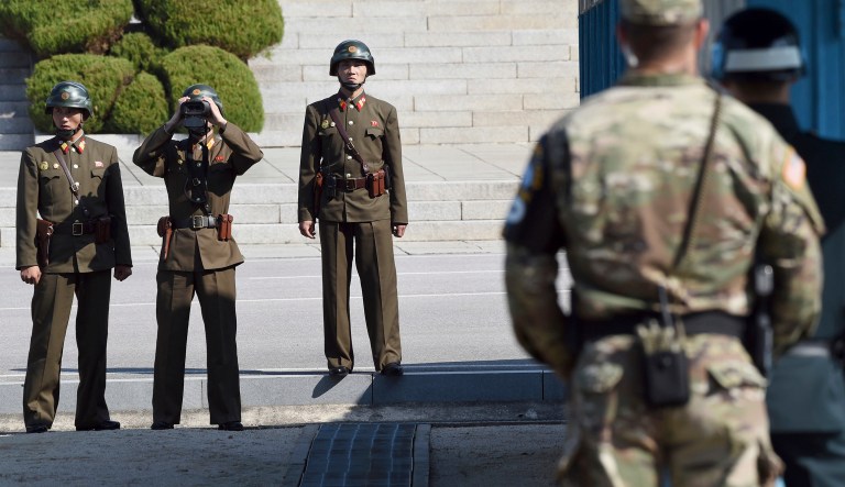 A North Korean soldier seeking to defect was headed for the border of South Korea in an automobile when a wheel from his vehicle came loose, causing him to flee from North Korean soldiers' fire on foot on Nov. 13. He is now hospitalized south of the border. (Jung Yeon-je/Pool Photo via AP)