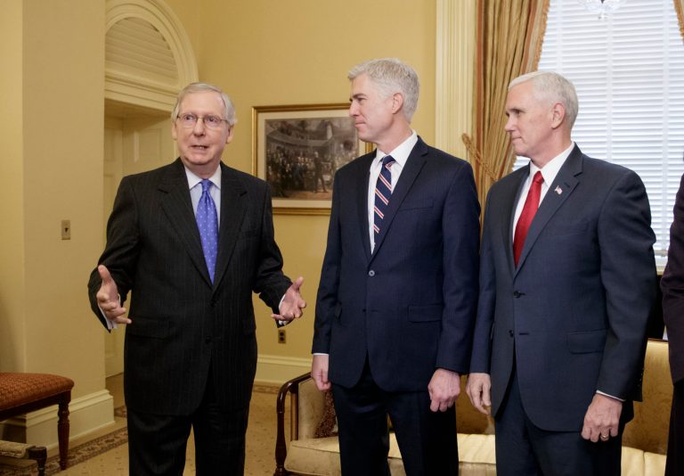 Supreme Court Justice nominee, Neil Gorsuch, center, is joined by Vice President Mike Pence, right, as they meet with Senate Majority Leader Mitch McConnell of Ky. on Capitol Hill in Washington, Wednesday, Feb. 1, 2017. Last year, Senate Republicans, led by McConnell, blocked a confirmation hearing for Judge Merrick Garland, President Barack Obama's pick for the vacancy left by the death of Justice Antonin Scalia who died in February 2016. (AP Photo/J. Scott Applewhite)
