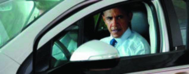 President Obama in a Chevy Volt. AP Photo.