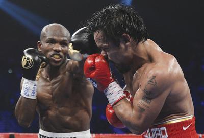 Kevork Djansezian/Getty Images
Tim Bradley, left, defeated Manny Pacquiao in a controversial decision Saturday.