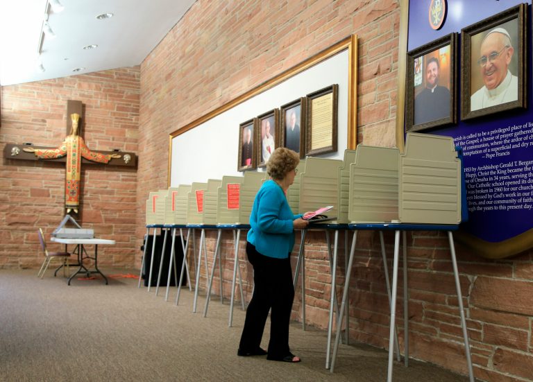 Mary Ann Herring works on her ballot at a polling station at Christ the King Church in Omaha, Neb., Tuesday, May 10, 2016, during the Nebraska primary election. (AP Photo/Nati Harnik)