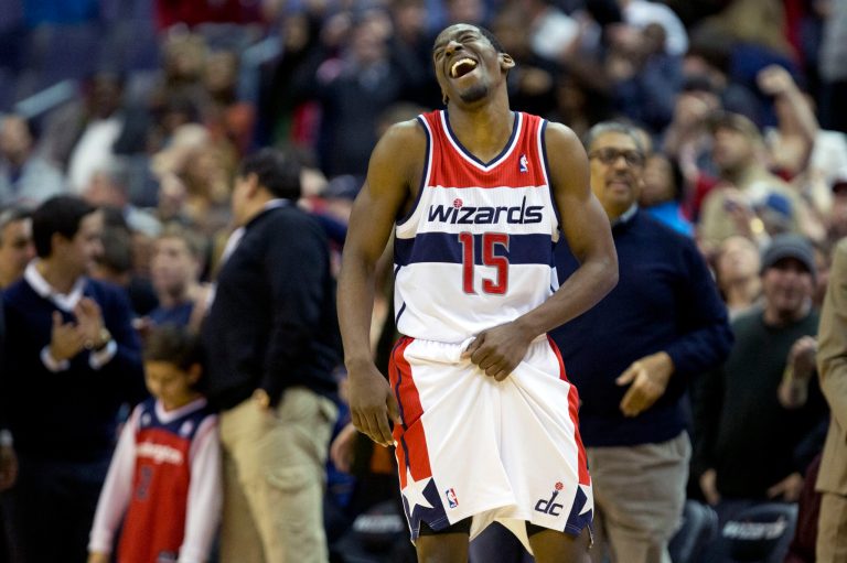   Washington Wizards shooting guard Jordan Crawford (15) laughs in the final seconds of an NBA basketball game as Washington defeated the Orlando Magic at the Verizon Center in Washington, Friday, Dec. 28, 2012. Washington won 105-97. (AP Photo/Jacquelyn Martin)  