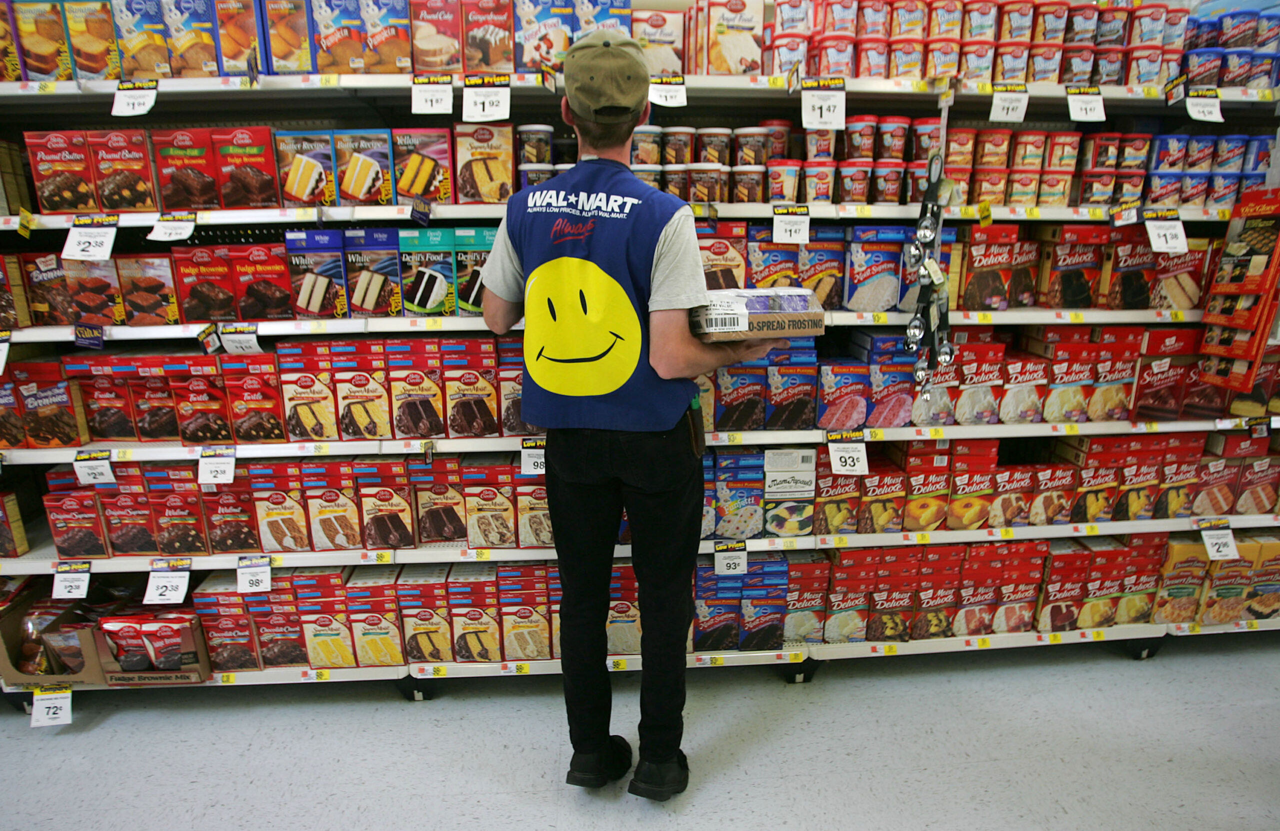 Civil rights group praises Walmart, Koch Industries on hiring policies