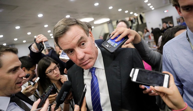 Just moments away from a government shutdown, President Trump took to Twitter to lay into Senate Intelligence Committee Vice Chairman Sen. Mark Warner, D-Va. (AP Photo/J. Scott Applewhite)