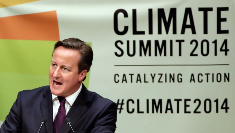 British Prime Minister David Cameron addresses the Climate Summit, at United Nations headquarters, Tuesday, Sept. 23, 2014. (AP Photo/Richard Drew)