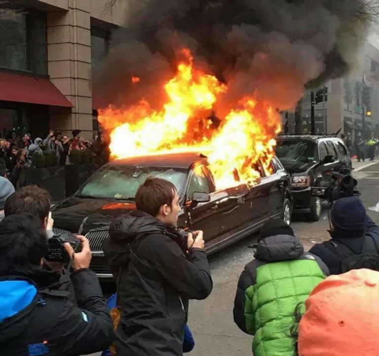Protesters set fire to limousine in Washington, DC, destroying the livelihood of a Muslim immigrant. (Photo via Muhammad Ashraf)