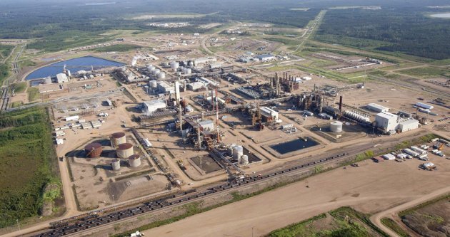 This Nexen oil sands facility near Fort McMurray, Alberta, Canada, is among the many energy assets obtained by a Chinese state-owned firm's $15.1 billion takeover. The U.S. Treasury Department approved the deal, which also includes millions of barrels of oil reserves and drilling rights in the Gulf of Mexico off the U.S. coast. (AP Photo)