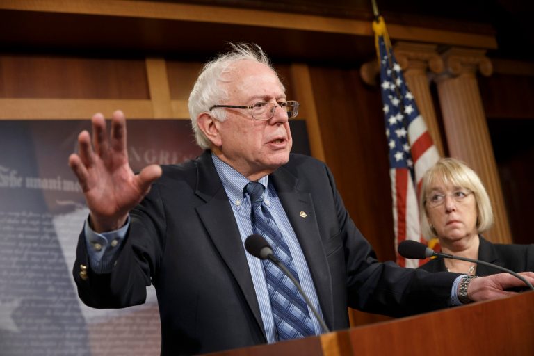 Sen. Bernie Sanders, I-Vt., chairman of the Senate Veterans Affairs Committee, joined at right by Sen. Patty Murray, D-Wash., talks to reporters at the Capitol in Washington, Thursday, Feb. 27, 2014. (AP Photo/J. Scott Applewhite)