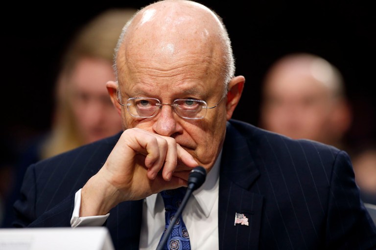 The White House was not signalling to National Intelligence Director James Clapper that he should curtail what classified information he shares with Donald Trump, a spokesman said. (AP Photo/Alex Brandon, File)