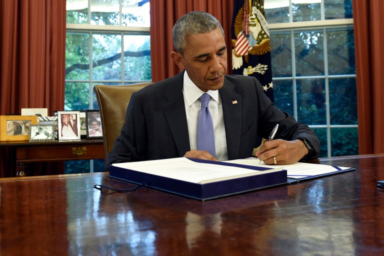 President Obama on Thursday signed into law the spending bill that will keep the federal government open until Dec. 9. (AP Photo/Susan Walsh, File)