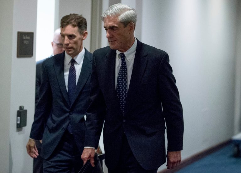 FILE - In this June 21, 2017, file photo, special counsel Robert Mueller departs Capitol Hill following a closed door meeting in Washington. Mueller's team of investigators has recently questioned a former British spy who compiled a dossier of allegations about President Donald Trump's ties to Russia. (AP Photo/Andrew Harnik)