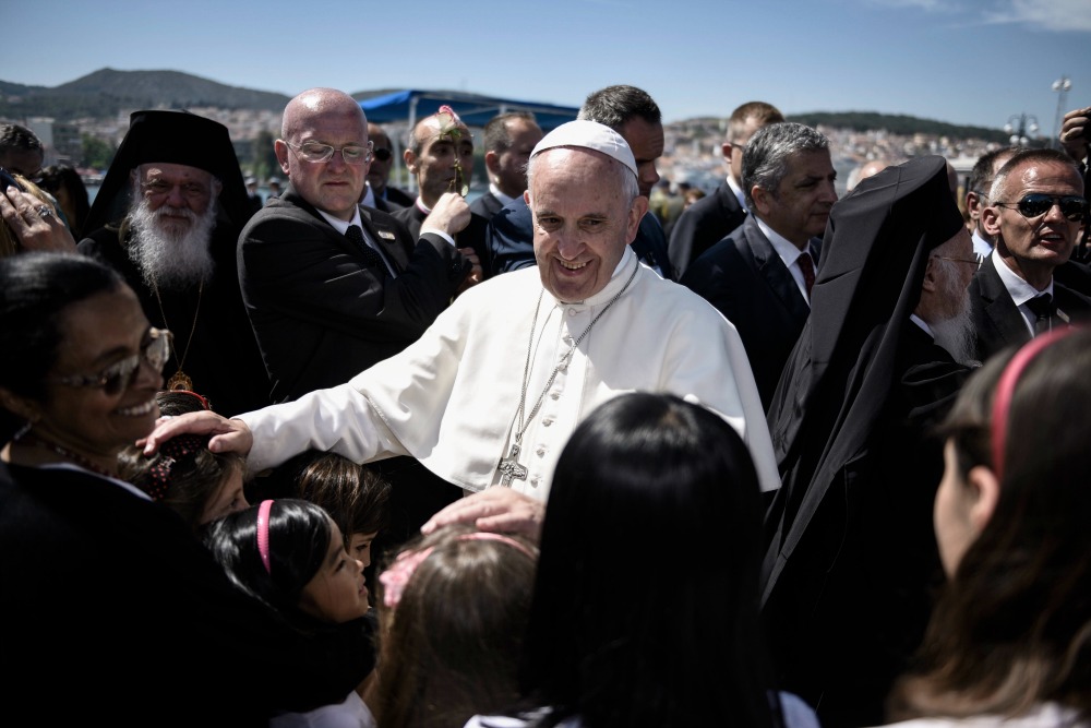 Pope takes 12 Syrian Muslims home to Rome