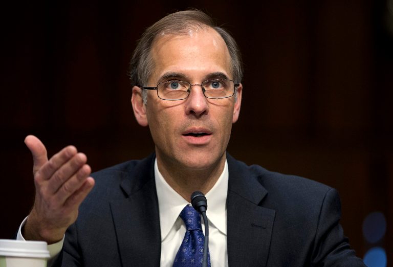Mark Zandi is the de facto referee of Washington's roiling fiscal arguments.  (AP Photo/ Evan Vucci)