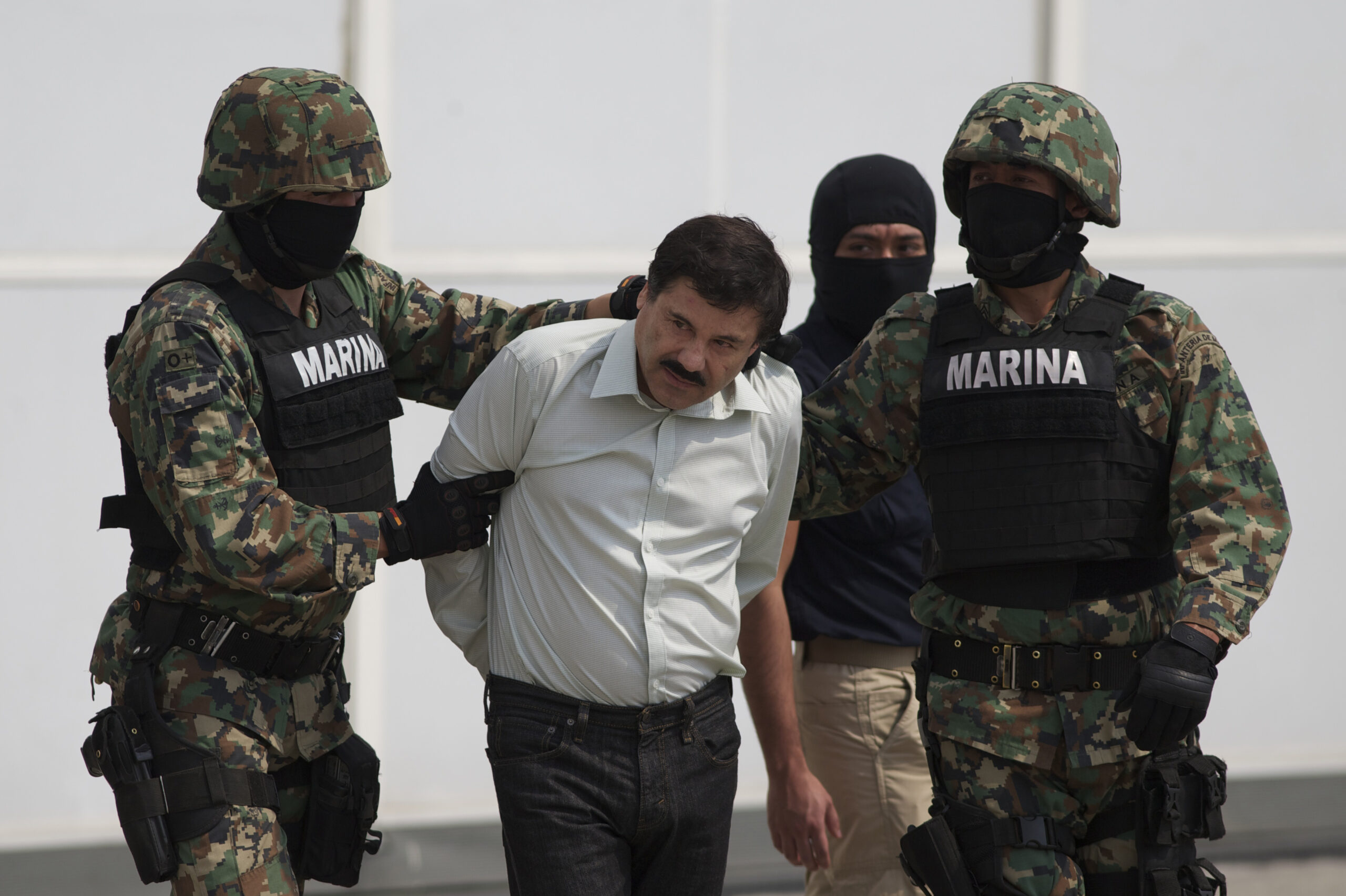 Most-wanted capo looks pudgy, bowed post-arrest