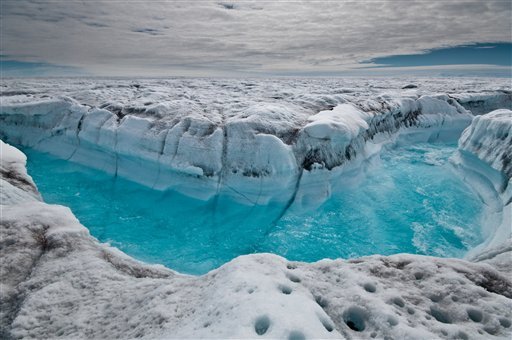 EMBARGOED UNTIL 2 P.M., EST, THURSDAY, NOV. 29 - This handout image provided by Ian Joughin, shows surface melt water rushing along the surface of the Greeland Ice Sheet through a supra-glacial stream channel on July 4, 2012, southwest of Ilulissat, Greenland.  Polar ice sheets are now melting three times faster than in the 1990s, but so far that's added just less than half an inch to already rising global sea levels, a new giant scientific study says.  While the amount of sea level rise isn't as bad as some earlier worst case scenarios, the acceleration of the melting, especially in Greenland, has ice scientists worried. (AP Photo/Ian Joughin)