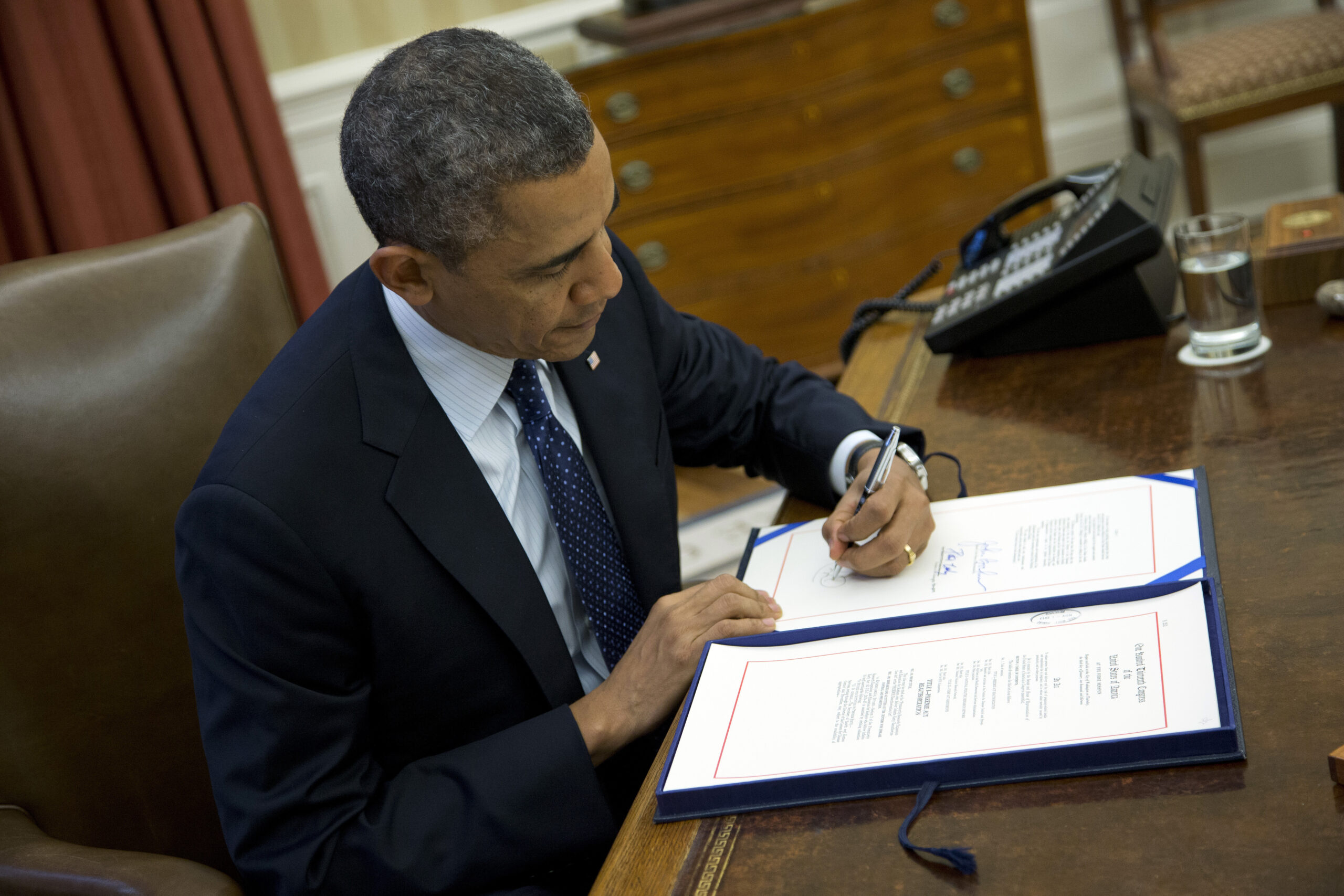 Obama signs bill for more scrutiny for drug mixers