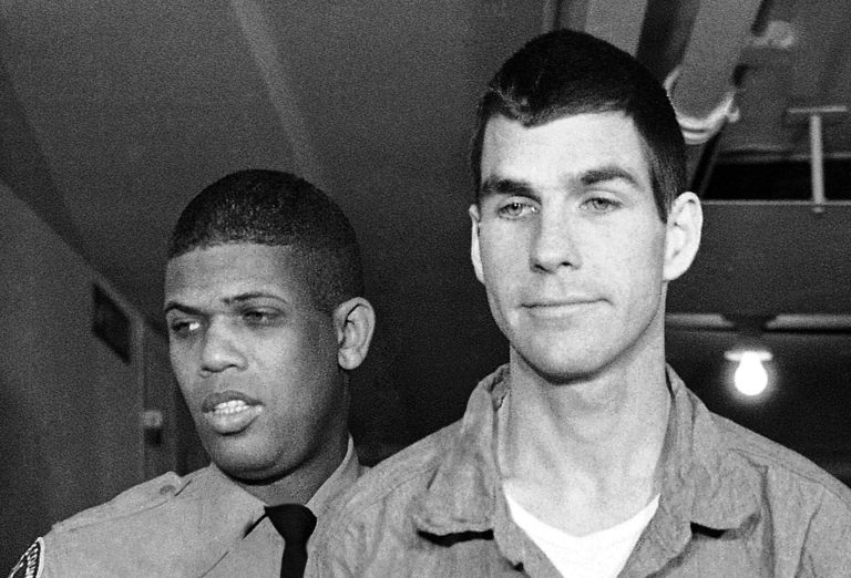   FILE - This March 1, 1971, file photo shows Charles Tex Watson, right, arriving for court in Los Angeles, Calif. Watson wrote in a motion filed Thursday, June 7, 2012 that Los Angeles police should be allowed to listen to but not take possession of eight hours of audio recordings of conversations made four decades ago with attorney Bill Boyd. Watson is serving a life sentence for his role in the 1969 Tate-La Bianca murders. (AP Photo/Wally Fong, File)  