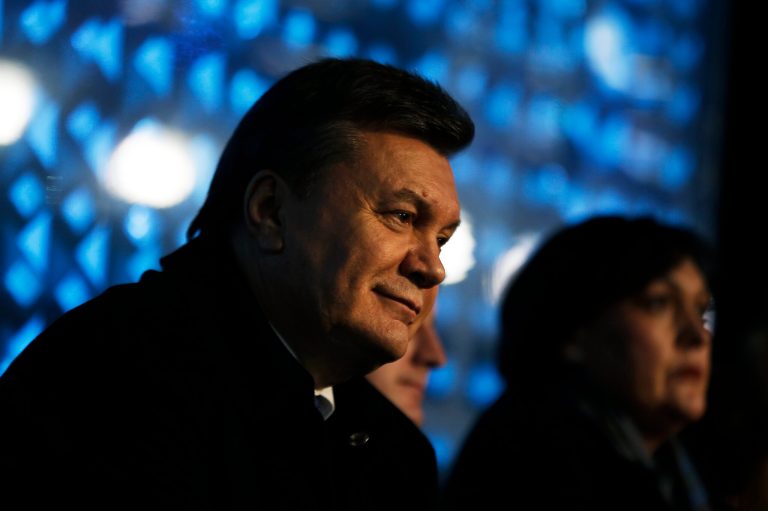 Ukrainian President Viktor Yanukovych watches the opening ceremony of the 2014 Winter Olympics, Friday, Feb. 7, 2014, in Sochi, Russia. (AP Photo/David Goldman, Pool)